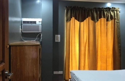 Lila Bed & Breakfast | Lovely Bedroom in Lila, Bohol with AC