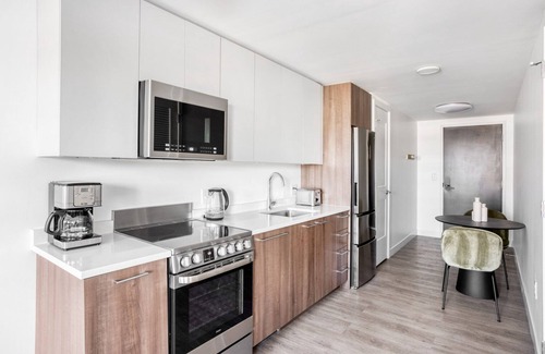 Central Square Apartment | Lovely Central Square Studio w/Gym, W/D & Roof, near T, by Blueground