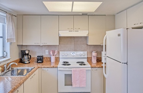 Naples Park House | Lovely dog-friendly duplex near Gulf with enclosed yard, central AC, & W/D