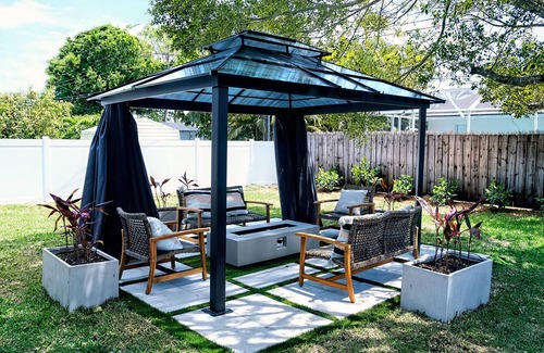 Naples Park House | Lovely dog-friendly duplex near Gulf with enclosed yard, central AC, & W/D