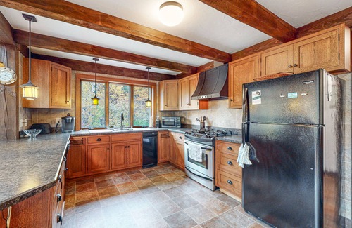 Gilford House | Lovely dog-friendly home with firepit, gas fireplace, EV outlet, & washer/dryer