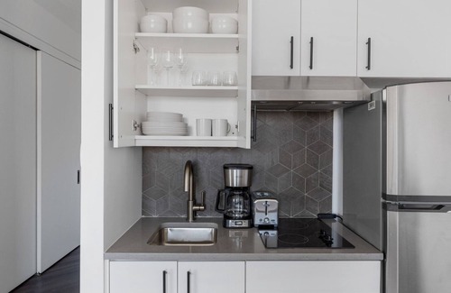 East Village Apartment | Lovely East Village 1BR w/Balcony, Garden & Gym, nr Bars, by Blueground