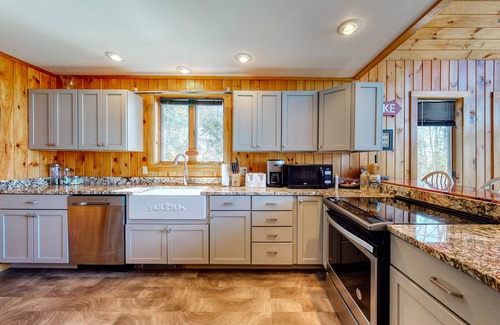 Harrison House | Lovely home on Crystal Lake with private dock, lake views, deck, & grill