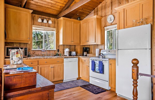 Lodge Hill House | Lovely home with fireplace, roomy deck, washer/dryer & EV charging - near ocean