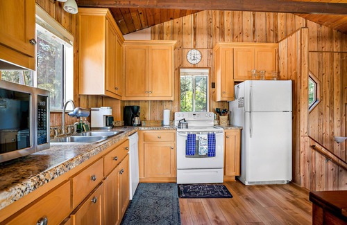 Lodge Hill House | Lovely home with fireplace, roomy deck, washer/dryer & EV charging - near ocean