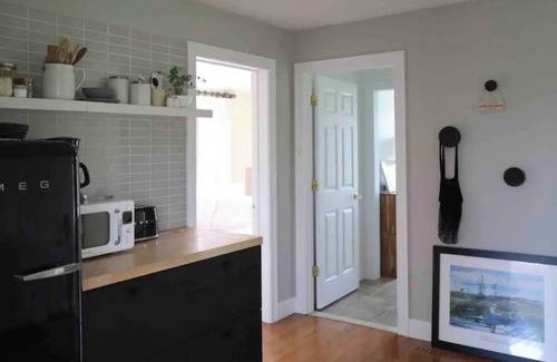 Block Island House | Lovely Home with quaint living spaces and 180 views of the Atlantic Ocean.