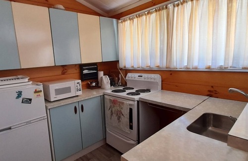 Turangi Cottage | Lovely Lockwood River Cottage