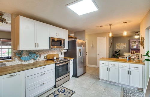 Surfside Estates House | Lovely Merritt Island Home w/Kayak + Fire Pit!