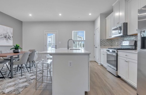 Glenarden House | Lovely, newly-built, 3-bedroom townhome with an office & 2-car garage in Lanham