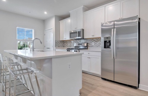 Glenarden House | Lovely, newly-built, 3-bedroom townhome with an office & 2-car garage in Lanham