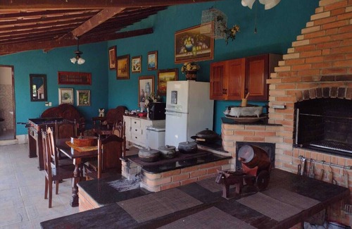 Quatis House | Lovely place, suite with fireplace.