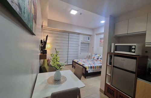 Iloilo Condo | Lovely Studio centrally located to vibrant city of love, Festive Walk Mall view.