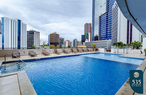 Caminho das Arvores Apartment | Lovely Suite Compact Kitchen in Central Region