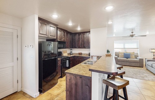 Moab South Valley House | Lovely townhome near town with pool, hot tub, playground, patio & tennis