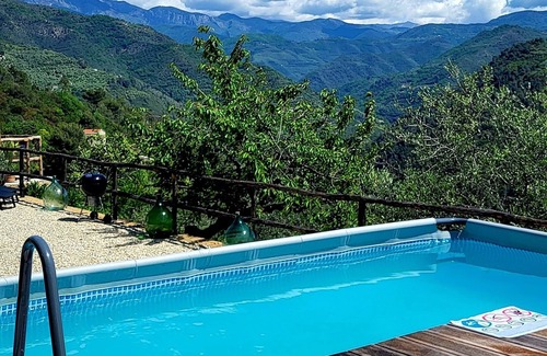 Dolceacqua Cottage | Lovely VacationHome immersed in nature, stunning views,pool,outdoor kitchen,WIFI