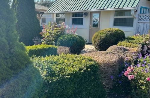 Oak Harbor Cottage | Lovely water and garden views. Two minutes drive to beaches, six to either town!