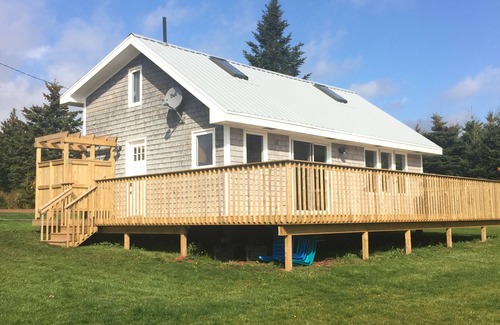 Souris Cottage | Lovely waterfront cottage on private white sand beach