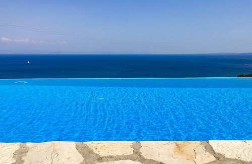 Perama Villa | Lovely Well Located Villa, Private Infinity Pool, Spectacular Sea Views close to Benitses Resort!