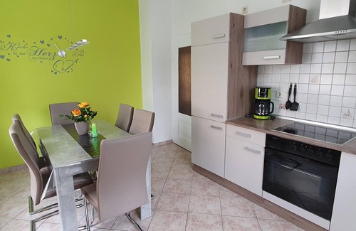 Schwarzenberg/Erzgeb. Apartment | Lovingly furnished, new vacation apartment with washing machine, large kitchen, large bathroom with shower and bathtub, parking space, box spring bed.