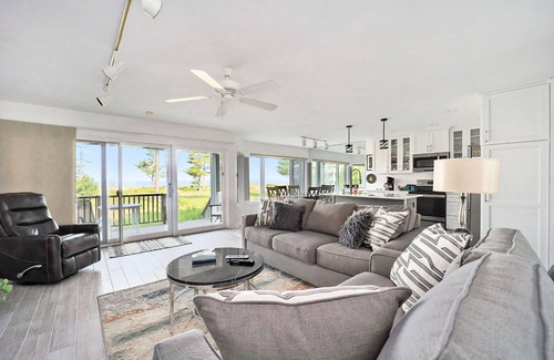 Glen Arbor Condo | Lower-level beachfront condo with deck, lake views, washer/dryer, fireplace
