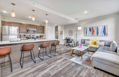 Gateway District Apartment | Luxe 1B in Heart of Downtown Pool & Spa Gym