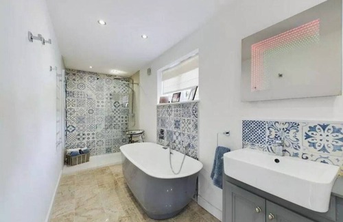 Worthing House | Luxe Bungalow w/Hot tub, Games