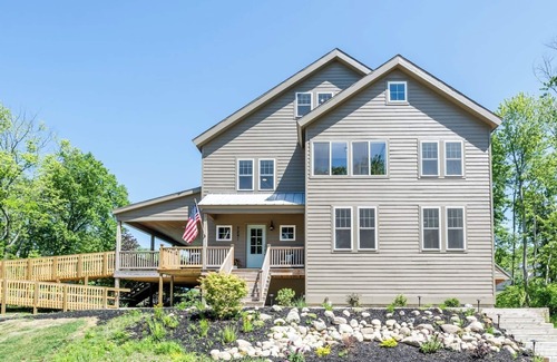 Miami Park House | Luxe family-friendly lake house-hot tub, heated pool, great golf nearby, & more!