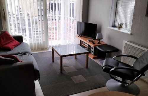 Blankenberge Apartment | luxe hotelkamer rechtstreeks aan de boulevard en zee 4pers