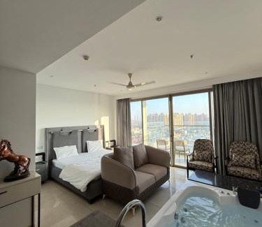 Gurugram Apartment | Luxe jacuzzi studio key 2