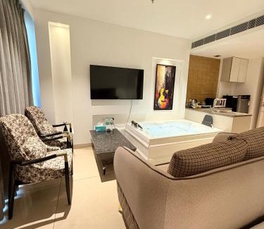 Gurugram Apartment | Luxe jacuzzi studio key 2