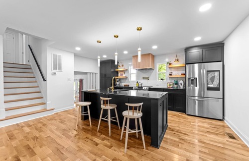 Northeast Raleigh House | Luxe MidCentury 3BR Home - SpaBath, WineBar, Chef’s Kitchen, KingBed, FencedYard