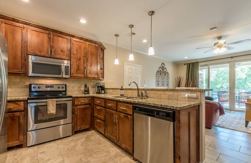New Braunfels Condo | LUXE RIVERFRONT nCONDOnon the Guadalupe RivernMid Term Rental Allowed n30+ daysn