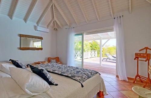 Plum Bay House | Luxueuse Villa avec Piscine Privée et Jardin dans un Cadre Sécurisé à Terres Basses, Marigot - FR-1-734-12
