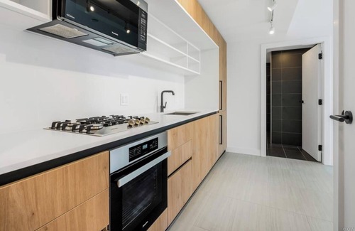 Renfrew-Collingwood Apartment | Luxurious 2BR Condo with Private Balcony