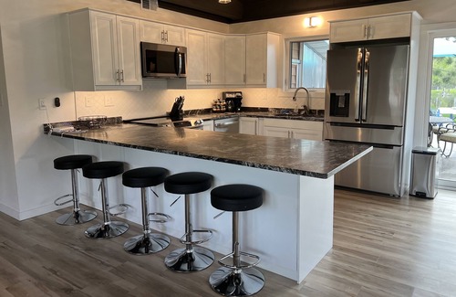 Sturgeon Lake House | Luxurious and Fun Lake Cottage Near Munger & Soo Line. 8 kayaks, 2 paddleboards.