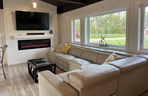 Sturgeon Lake House | Luxurious and Fun Lake Cottage Near Munger & Soo Line. 8 kayaks, 2 paddleboards.