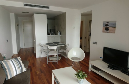Almadraba-Canyelles Apartment | Luxurious apartment in front of the beach, pool, parking and spectacular views