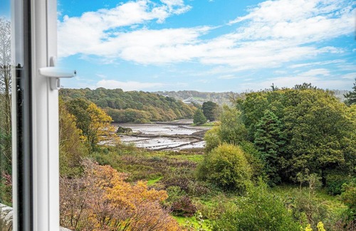Menai Bridge House | Luxurious Arts and Crafts Home set in 5 Acres of Garden & Woodland onto Straits