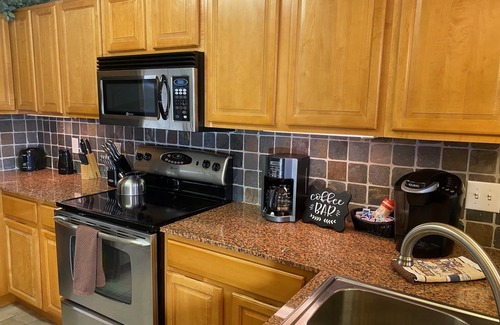 Sevierville Condo | Luxurious Condo, Riverfront w/Mountain Views, 1/4 mile from Tanger Outlet Mall