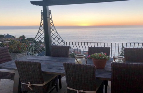 Bantry Bay Villa | Luxurious en-suite bedroom with lounge stunning sea view & balcony in Bantry Bay