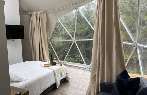 New Ross Resort | "Luxurious Escapes Await: Private Hot Tubs and Kayaks at Norse Geodesic Retreat"