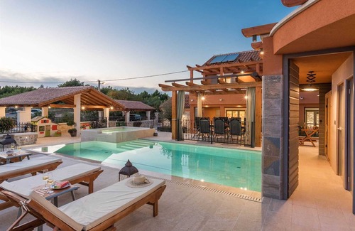 Bicine Villa | Luxurious five star heated pool villa for 10-12 people