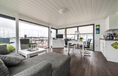 Rendbjerg House | Luxurious floating holiday home Flensburg Fjord/houseboat "Fjordblik"