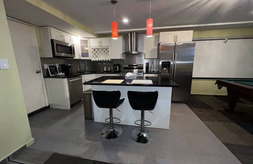 Wakefield Apartment | Luxurious home with jacuzzi with tv and pool table and