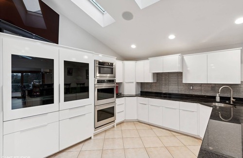 La Porte House | Luxurious Lakefront Estate with Pool, King Beds, Hot Tub MTM Premier Property Management
