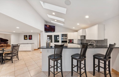 La Porte House | Luxurious Lakefront Estate with Pool, King Beds, Hot Tub MTM Premier Property Management