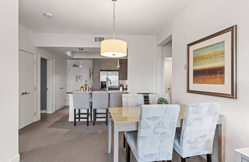 Vernon Condo | Luxurious Lakeside Living at The Strand! Pool, Hot Tub & Beach Access!