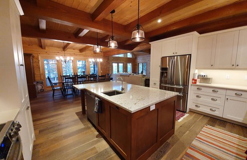Dysart et al House | Luxurious log cottage with 600-feet of waterfront, 90 Acres.