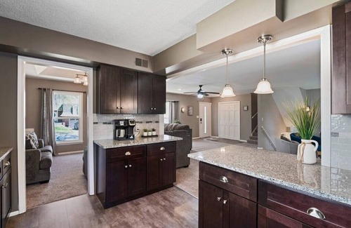 South Kansas City House | Luxurious Poolside Escape on 106th Street: Your Private Oasis in Kansas City