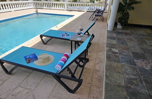 Juba Sound Cottage | Luxurious Private Cottage With Pool, Luscious Garden Views, And Refined Comfort.